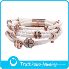 TKB-JB0039 Two tone women's stainless steel bracelets with artificial dimond rose gold four leaf clovers and white braided rope